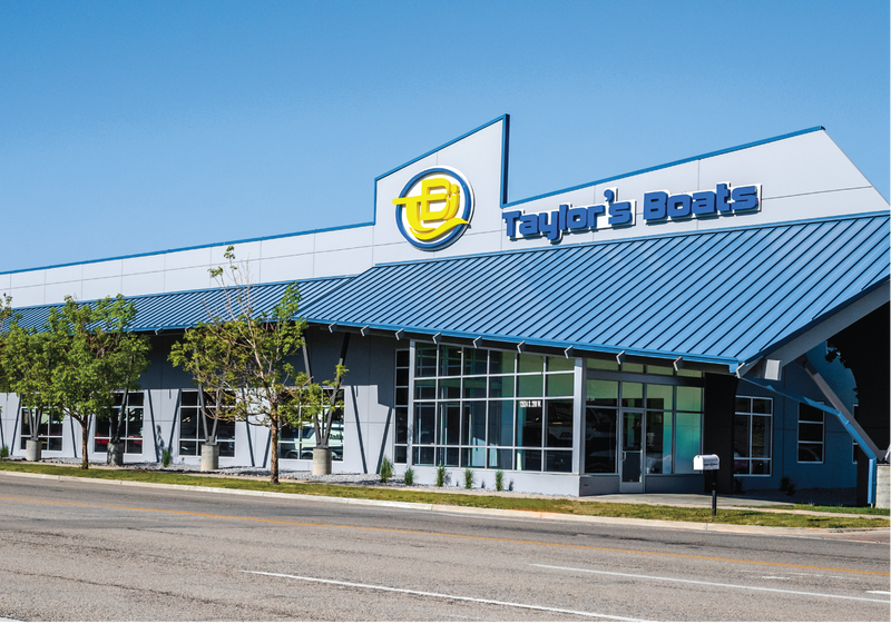 Taylor's Boats dealership storefront with blue and white exterior